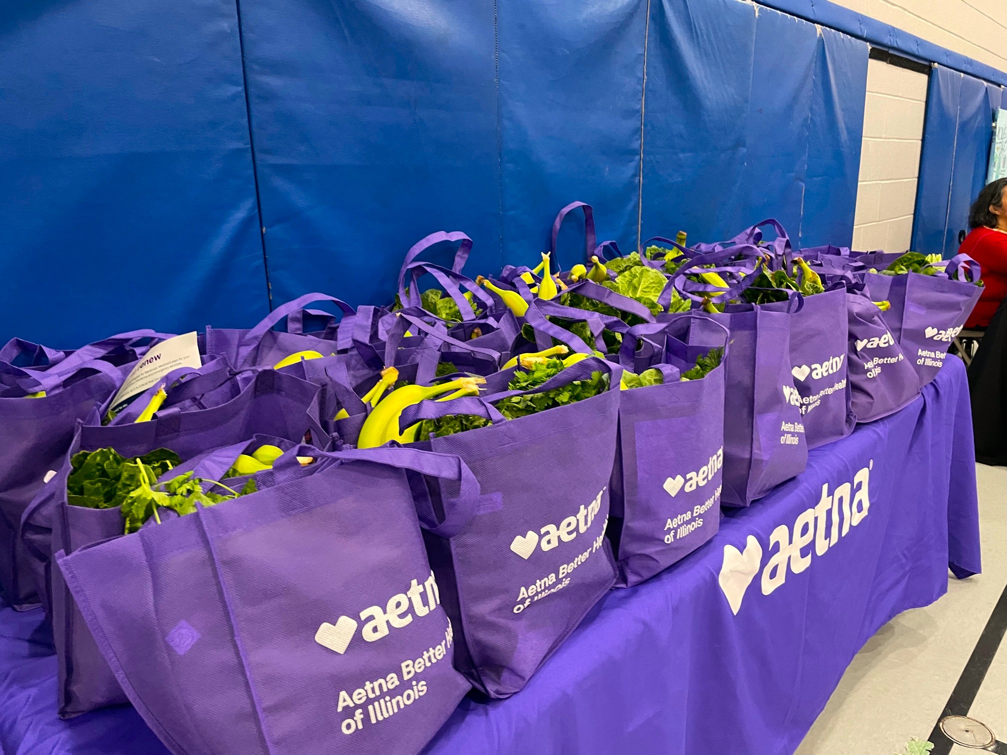 Fresh produce bags packed for community distribution at an HVP partner school.