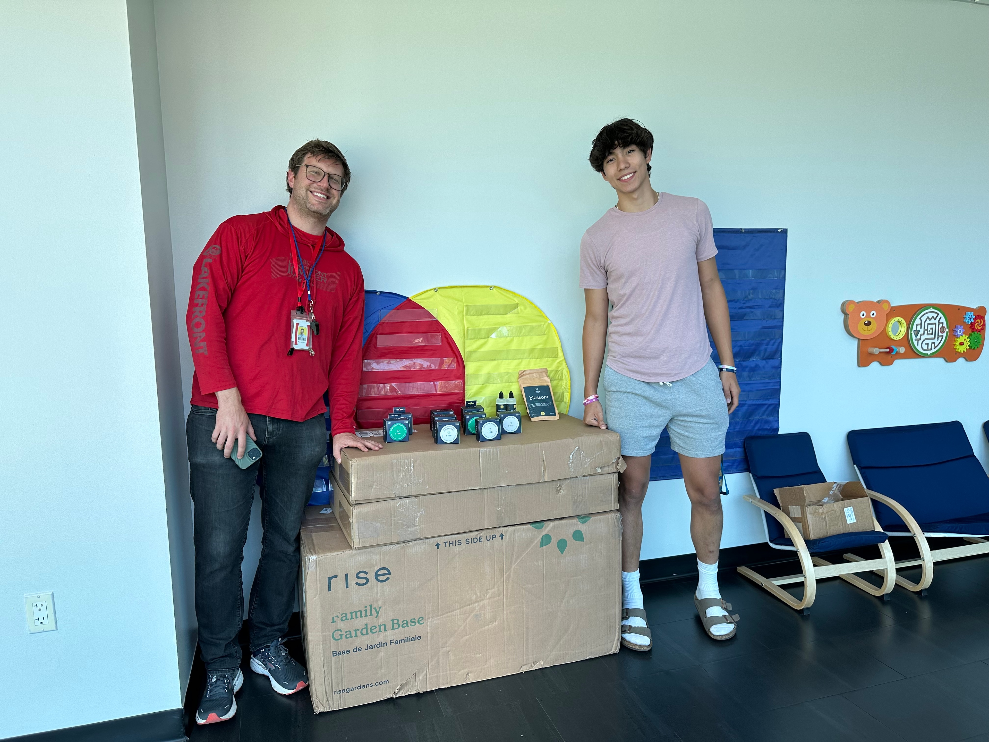 Kai Fogelson with teacher Ryan Johnson at Jovita Idár.