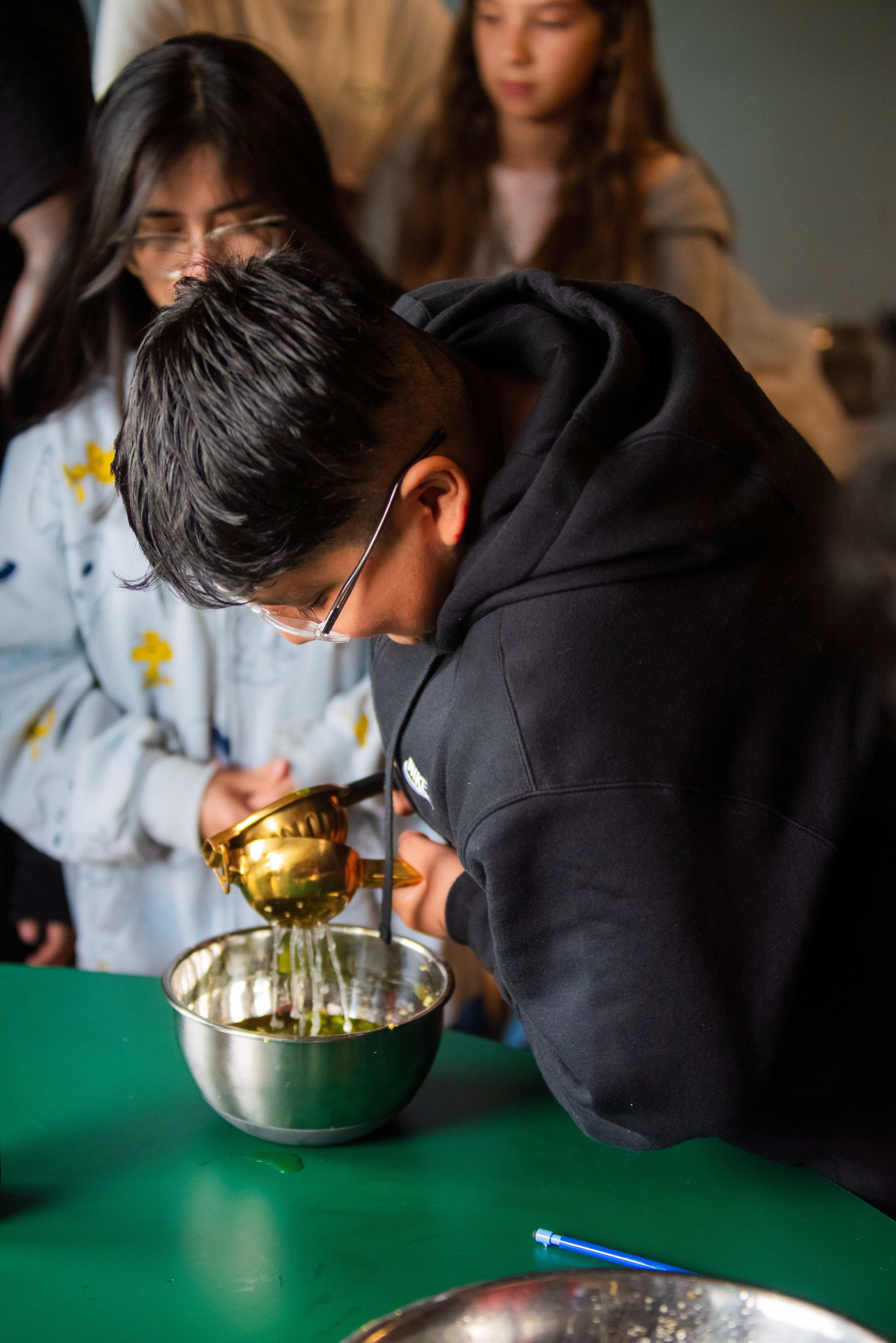 Talcott students working hands-on during a cooking workshop tied to the classroom garden.
