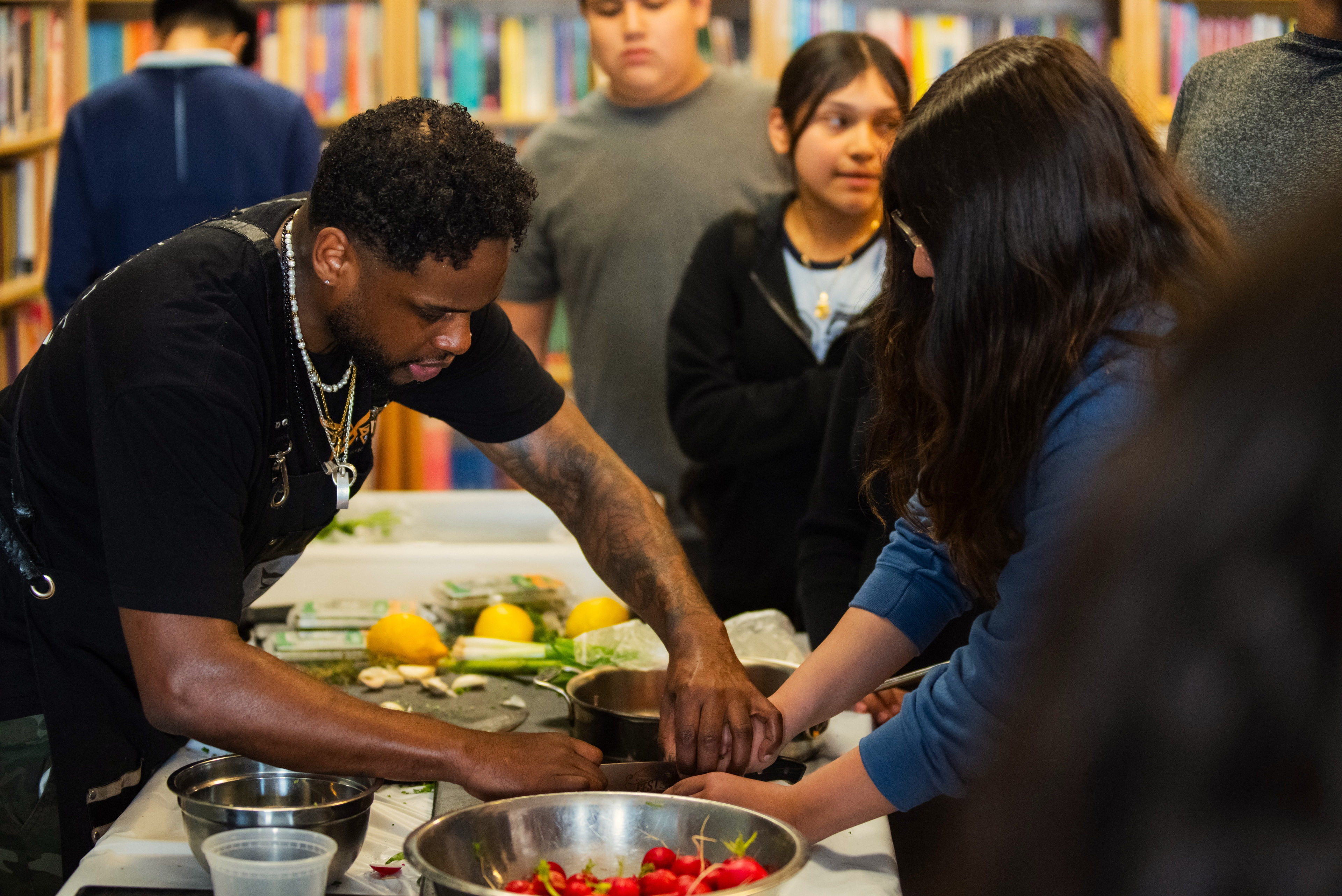 Chef Sebastian White leading a cooking demo for Talcott students.